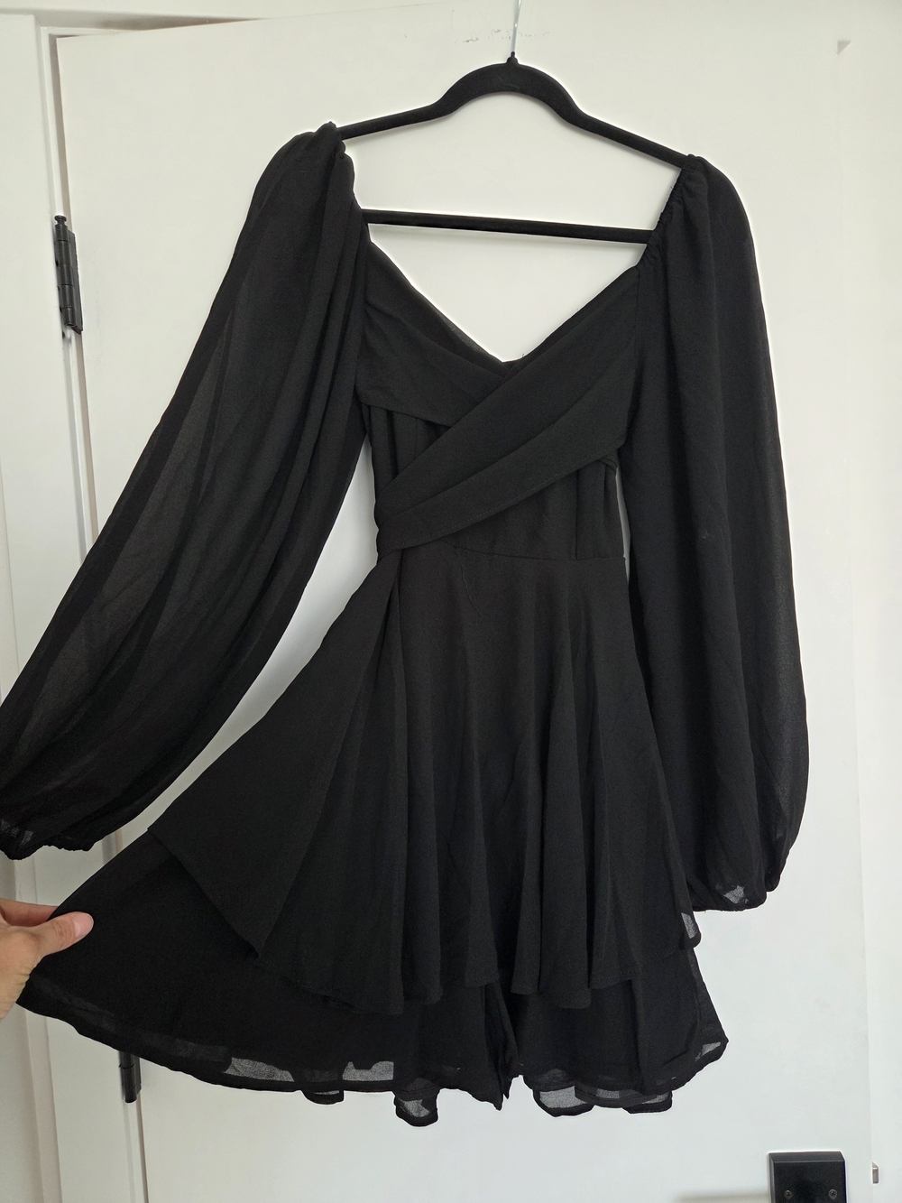 Francesca's Collections Black Long-Sleeve Wrap Mini Romper Dress